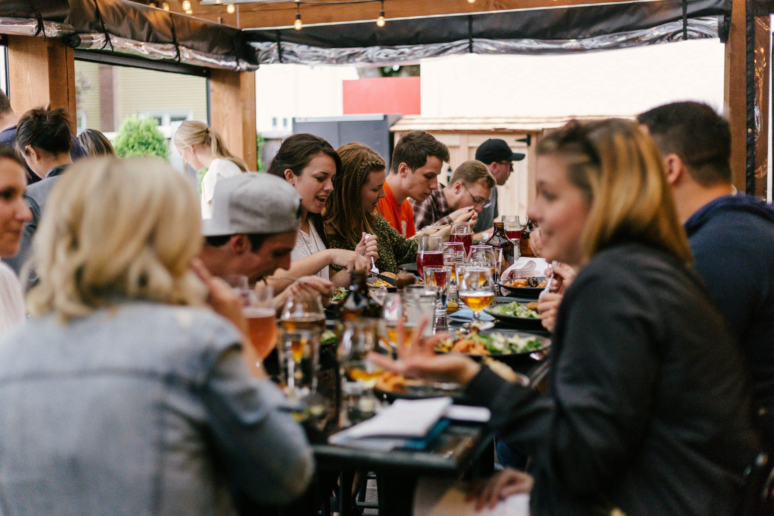 People dining in a full restaurant